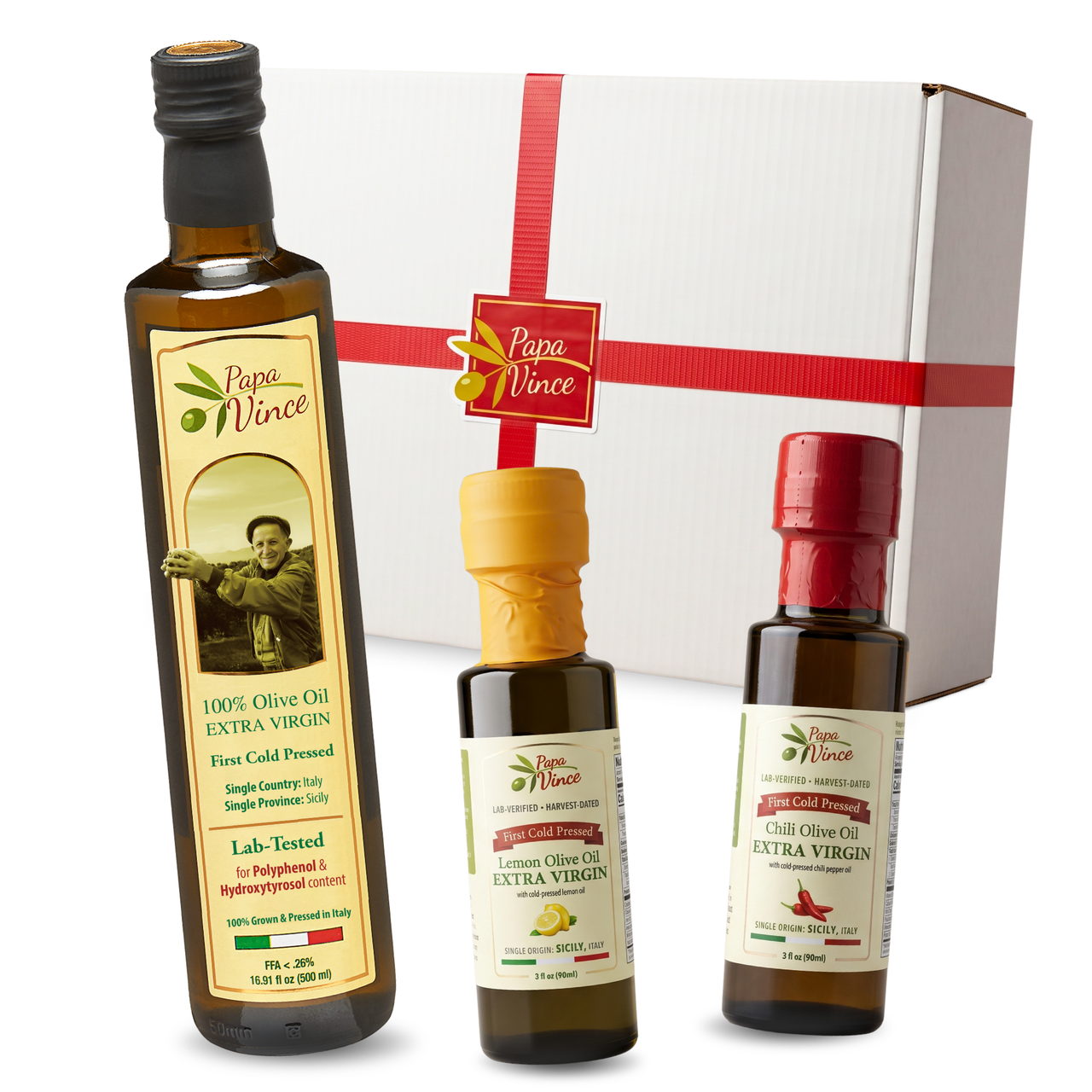 Sicilian Olive Oil Discovery Set: 500 ml extra virgin olive oil with lemon and chili 3 fl oz minis in front of a gift box, by Papa Vince