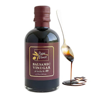 Thumbnail for Papa Vince Balsamic Vinegar of Sicily 40 bottle with a spoon drizzle showing rich texture and deep color.
